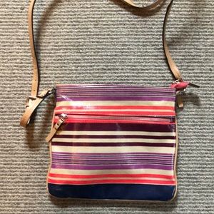 Medina colorfully striped crossbody purse.